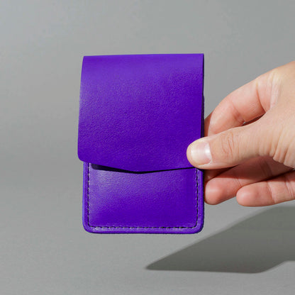 Lucky Wallet in Violet Latigo, held in hand, shot 3