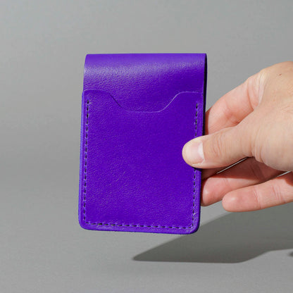 Lucky Wallet in Violet Latigo, held in hand, shot 4