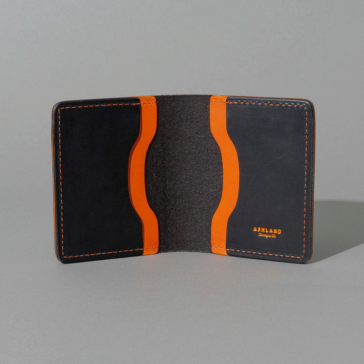 Tony the Ant in Black Dublin with Orange Accents, open, showing interior