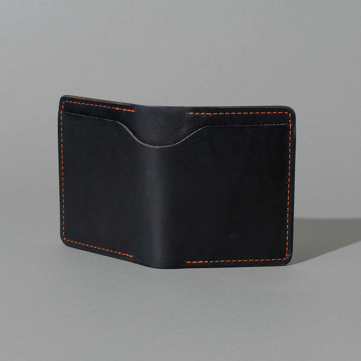 Tony the Ant in Black Dublin with Orange Accents, back view