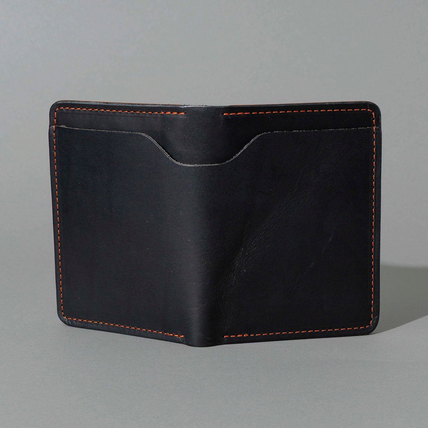 One-Off Fat Herbie in Black Dublin with Orange Accents, Two Hidden Card Slots, back view