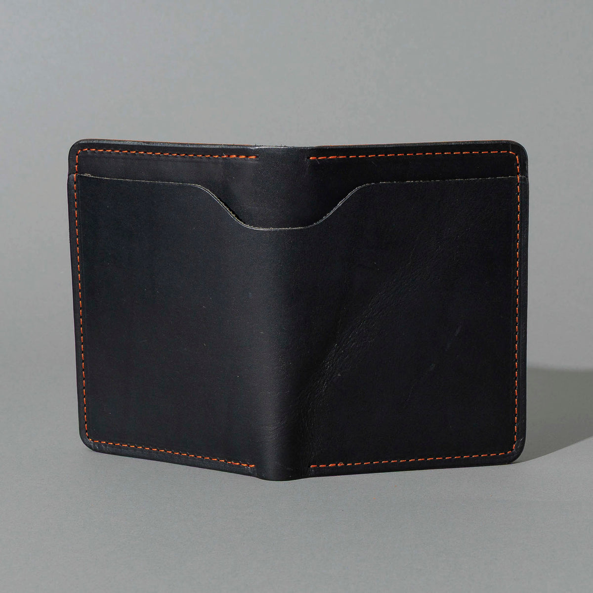One-Off Fat Herbie in Black Dublin with Orange Accents, Two Hidden Card Slots, back view