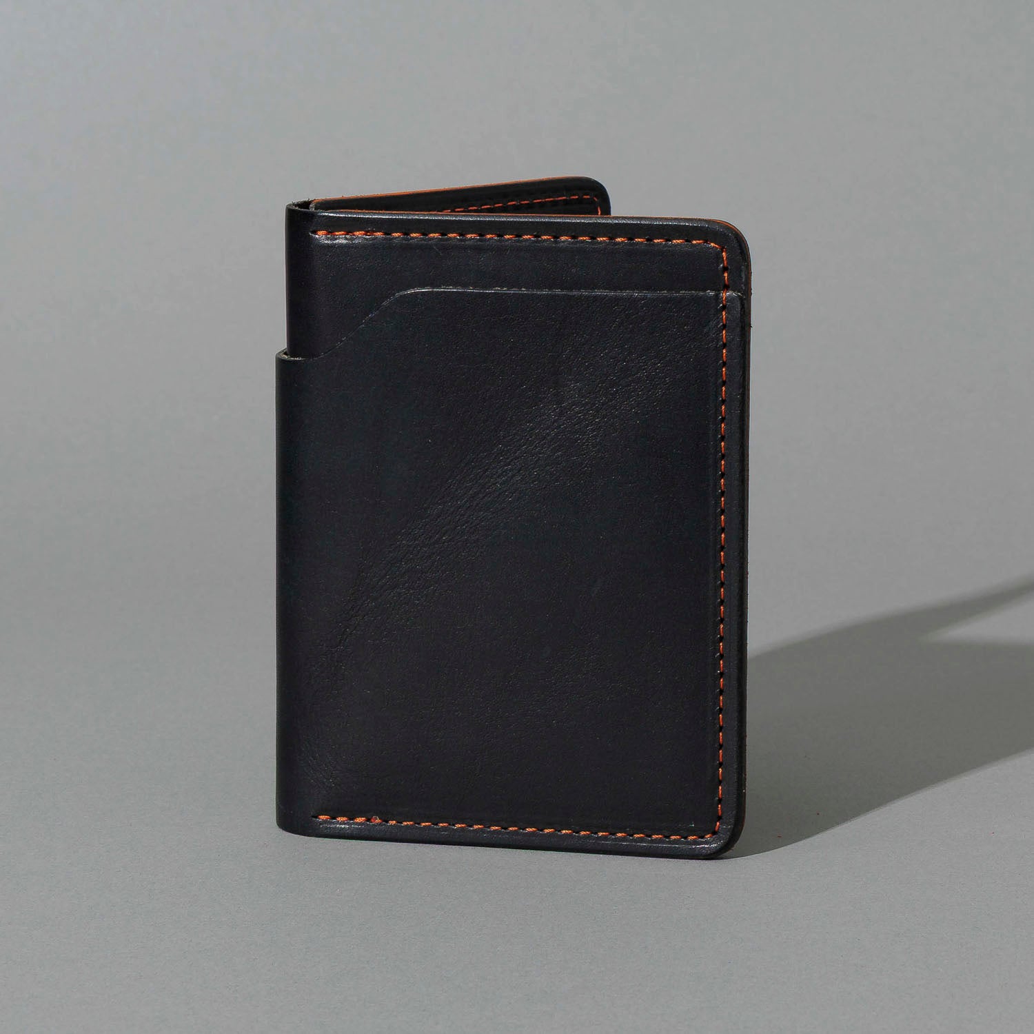 One-Off Fat Herbie in Black Dublin with Orange Accents, Two Hidden Card Slots, front view