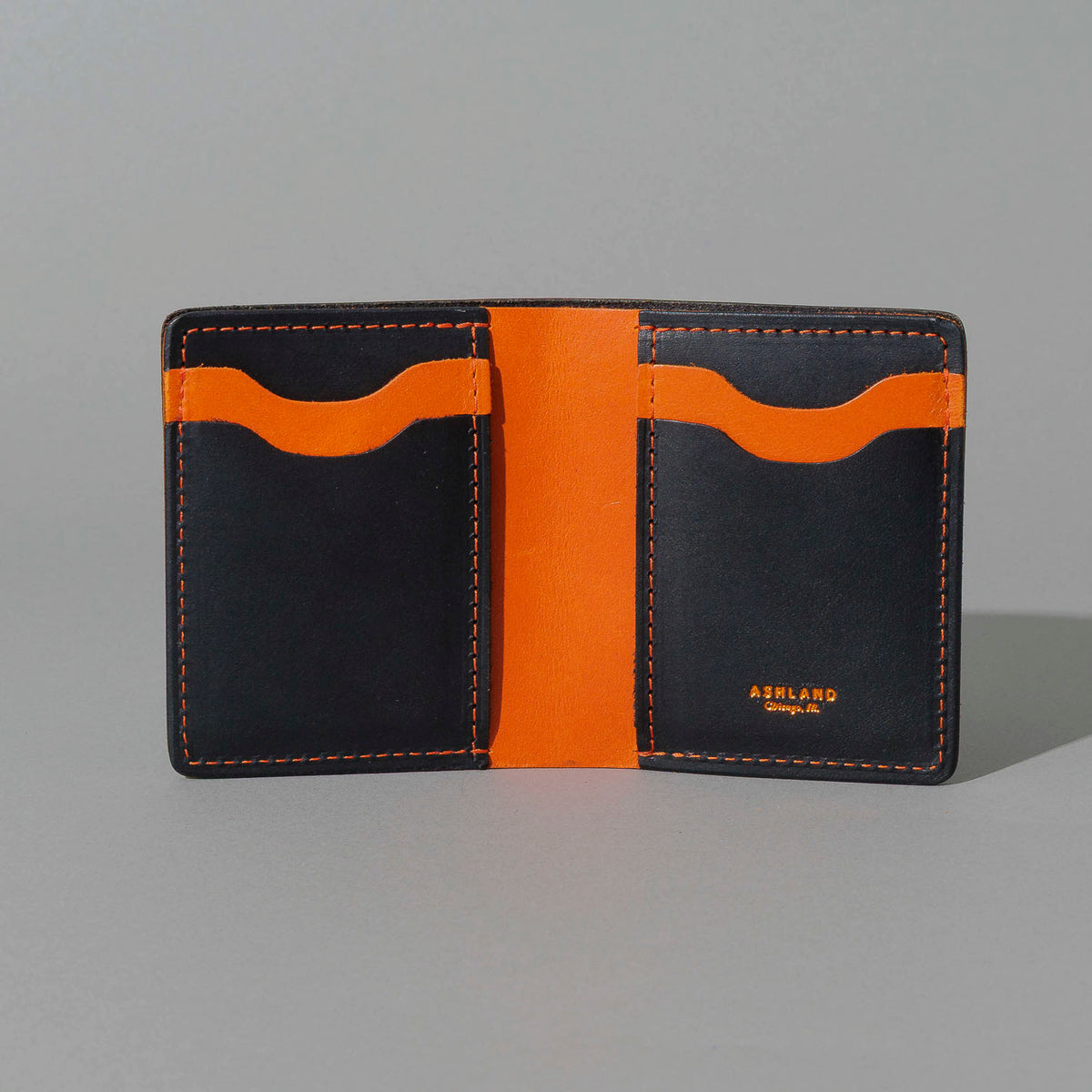 Tall Vertical Tony in Black Dublin with Orange Accents, open, showing interior