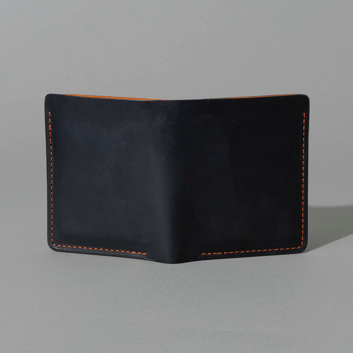 Tall Vertical Tony in Black Dublin with Orange Accents, front view