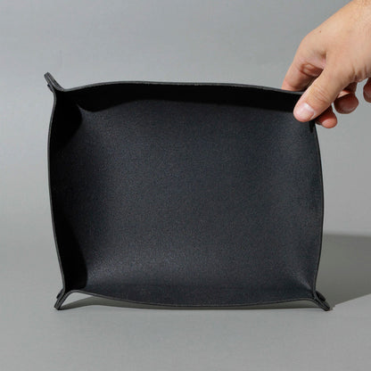 XL Valet Tray in Blacked Out Black Chromexcel®, assembled tray, held open by hand