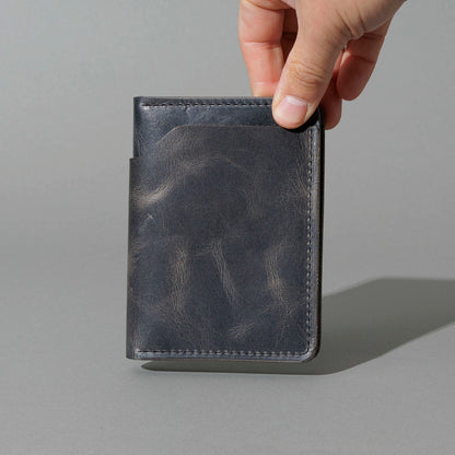 One-Off Fat Herbie in Slate Vintage, Horween® USA Stamp, held in hand