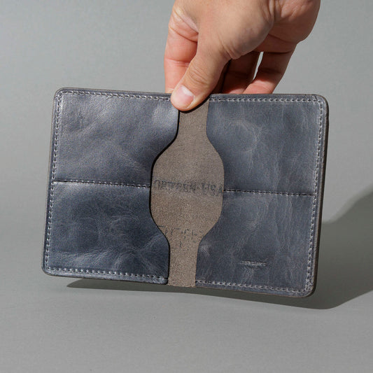 One-Off Fat Herbie in Slate Vintage, Horween® USA Stamp, held open in hand, shot 1