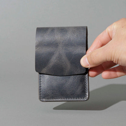Lefty Lucky Wallet in Slate Vintage, held in hand, shot 1