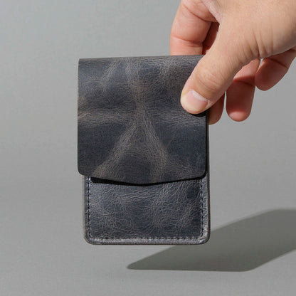 Lefty Lucky Wallet in Slate Vintage, held in hand, shot 3