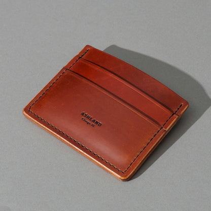 One-Off 5-Slot Frank the Enforcer in Blood Orange Shell Cordovan, angled view lying flat, shot 2