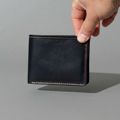 Johnny the Fox in Black Dublin with Multicolor Interior, held in hand, shot 2