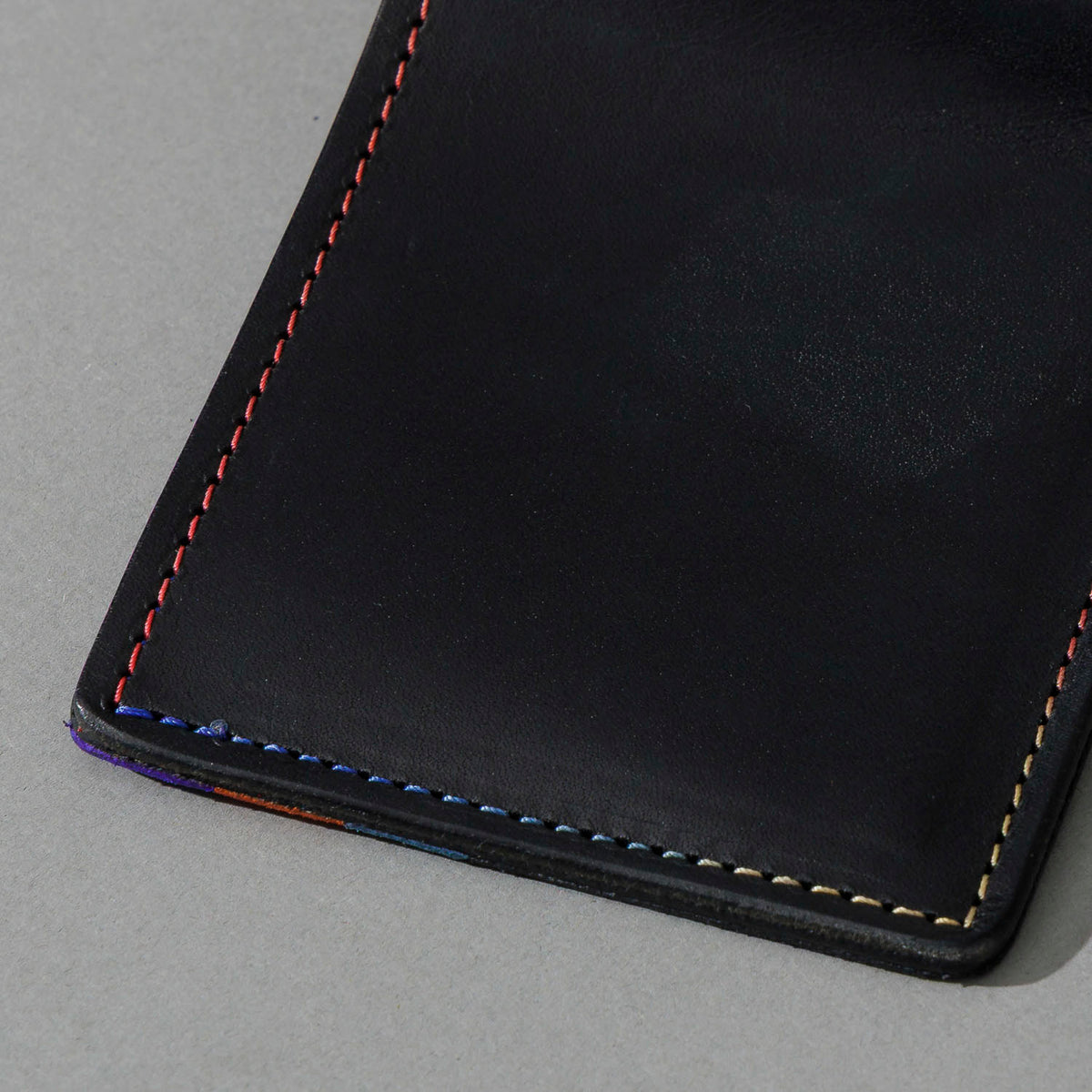Johnny the Fox in Black Dublin with Multicolor Interior, close-up detail
