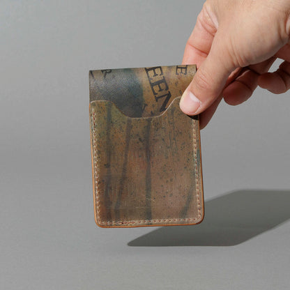 One-Off Lucky Wallet in Hand-Glazed Reverse Green Shell Cordovan, held in hand, shot 4