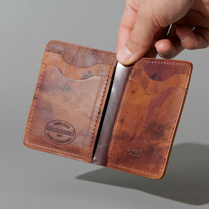 One-Off Vertical Bugs Moran in Hand-Glazed Reverse Color 8 Shell Cordovan, held open in hand, shot 2