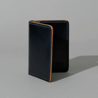 One-Off 50/50 Bugs Moran in Black and Reverse Shell Cordovan, standing upright, side angle