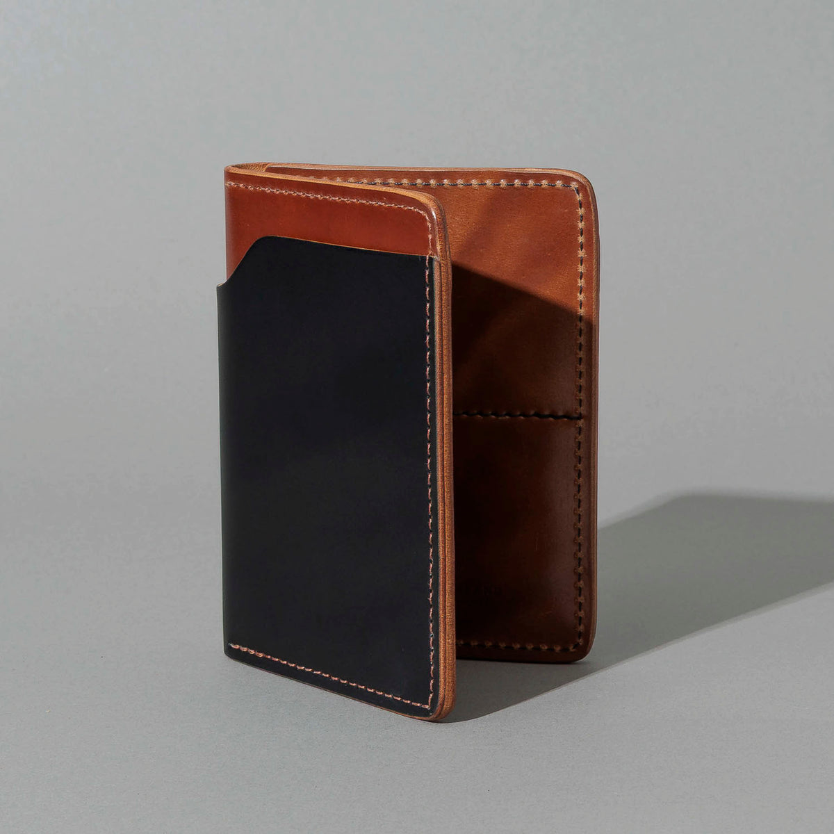 One-Off Fat Herbie in Black and Epic Natural Shell Cordovan, standing upright, side angle
