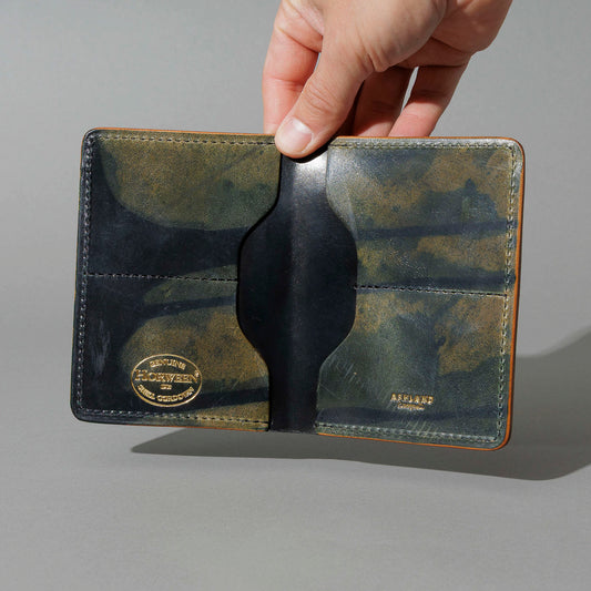 One-Off Fat Herbie in Hand-Glazed Epic Reverse Green Shell Cordovan, held open in hand, shot 2