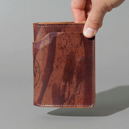 One-Off Fat Herbie in Hand-Glazed Epic Splatter Reverse Color 8 Shell Cordovan, held in hand