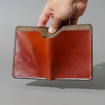 One-Off Fat Herbie in Amaretto on Reverse Shell Cordovan, Two Hidden Card Slots, held open in hand, shot 2
