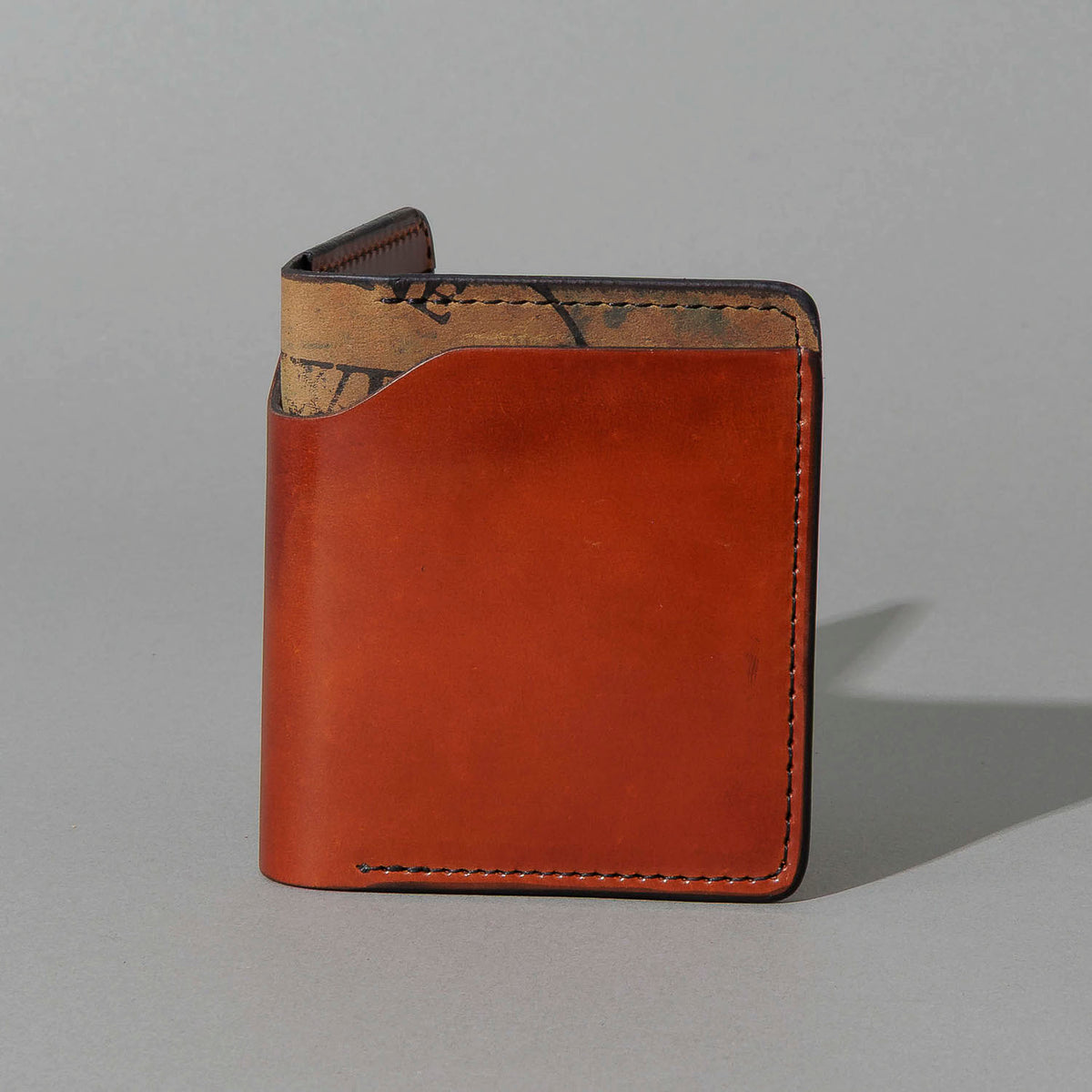 One-Off Vertical Tony the Ant in Blood Orange on Reverse Shell Cordovan, standing upright, side angle, shot 1