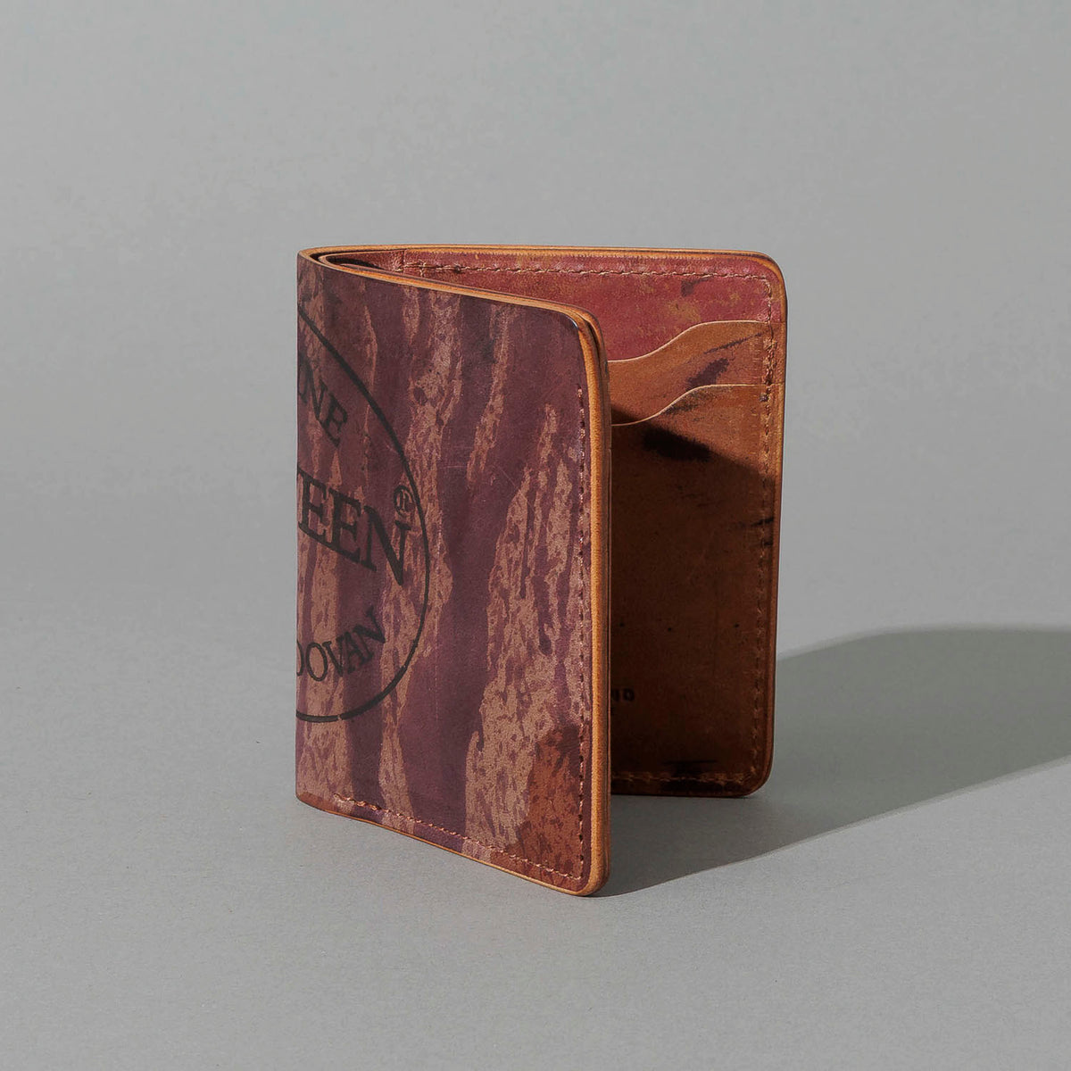 One-Off Tall Vertical Tony in Hand-Glazed Reverse Color 8 Shell Cordovan, standing upright, side angle