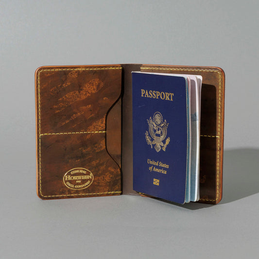 One-Off Traveler Passport Holder in Epic Splatter Reverse Cigar Shell Cordovan, No Bill Slot, open with a passport inside