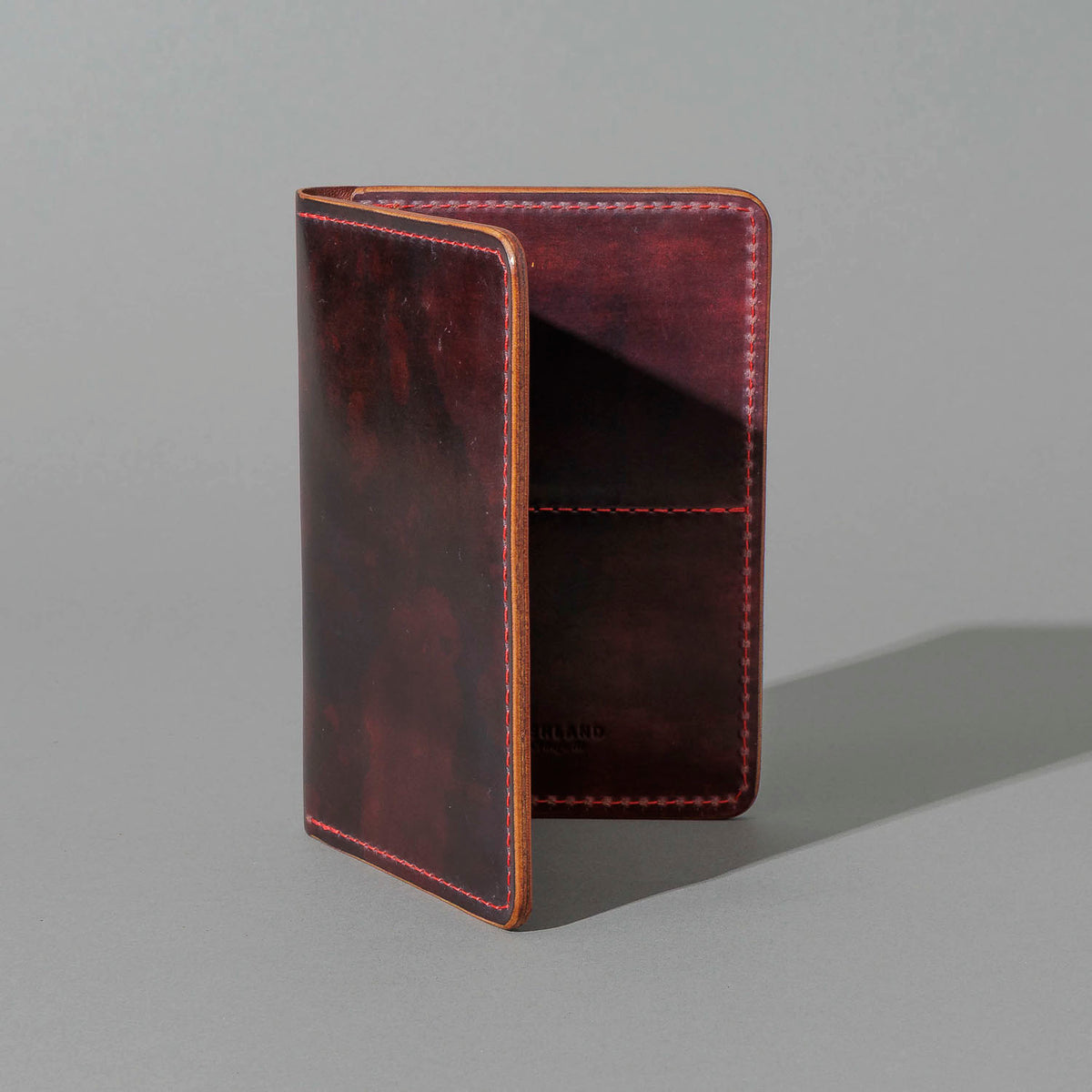 One-Off Traveler Passport Holder in Psychedelic Color 8 Shell Cordovan, No Bill Slot, standing upright, side angle