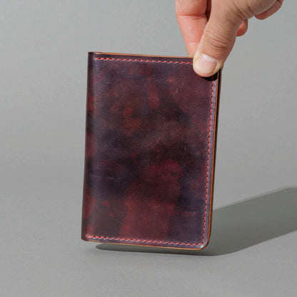 One-Off Traveler Passport Holder in Psychedelic Color 8 Shell Cordovan, No Bill Slot, held in hand