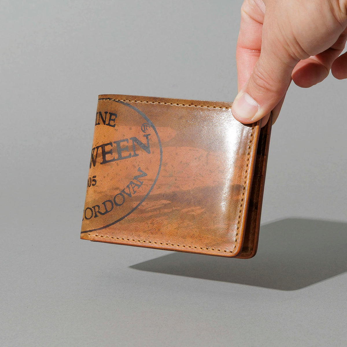 One-Off Johnny the Fox in Hand-Glazed Reverse Epic Splatter Cigar Shell Cordovan, held in hand