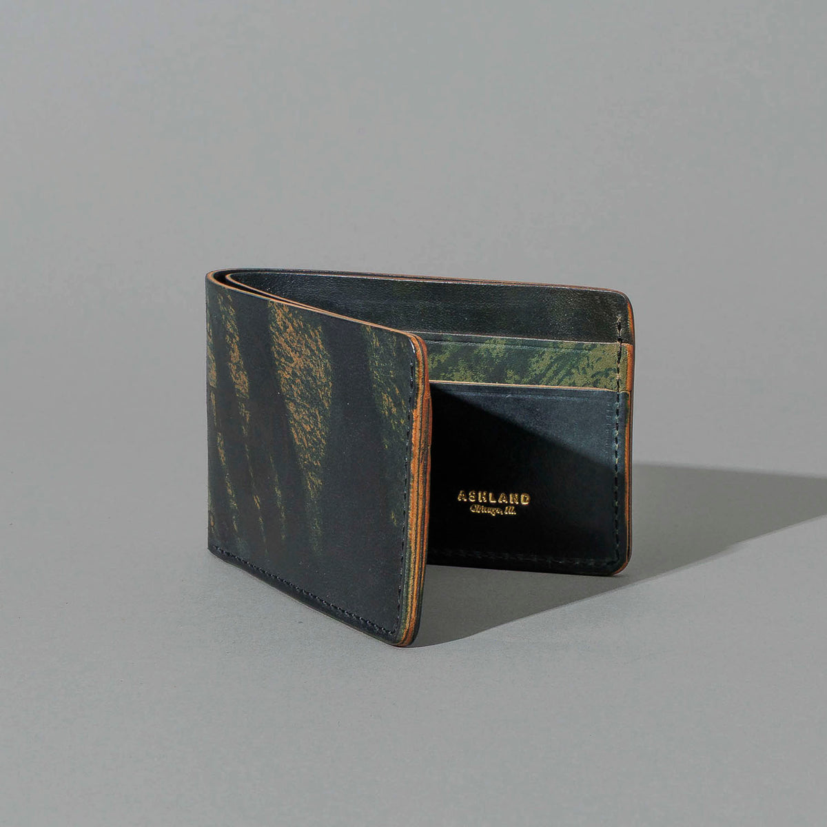 One-Off Nicky Slim in Hand-Glazed Epic Splatter Reverse Green Shell Cordovan, standing upright, side angle
