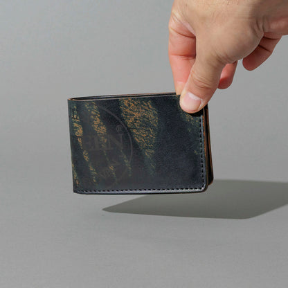 One-Off Nicky Slim in Hand-Glazed Epic Splatter Reverse Green Shell Cordovan, held in hand