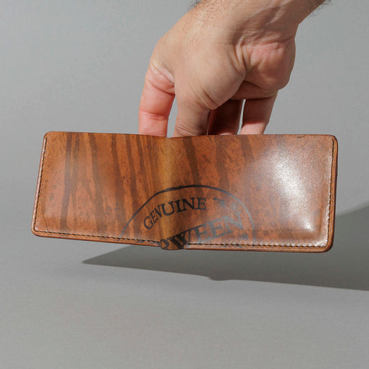 One-Off Nicky Slim in Hand-Glazed Reverse Epic Splatter Cigar Shell Cordovan, held open in hand, shot 1