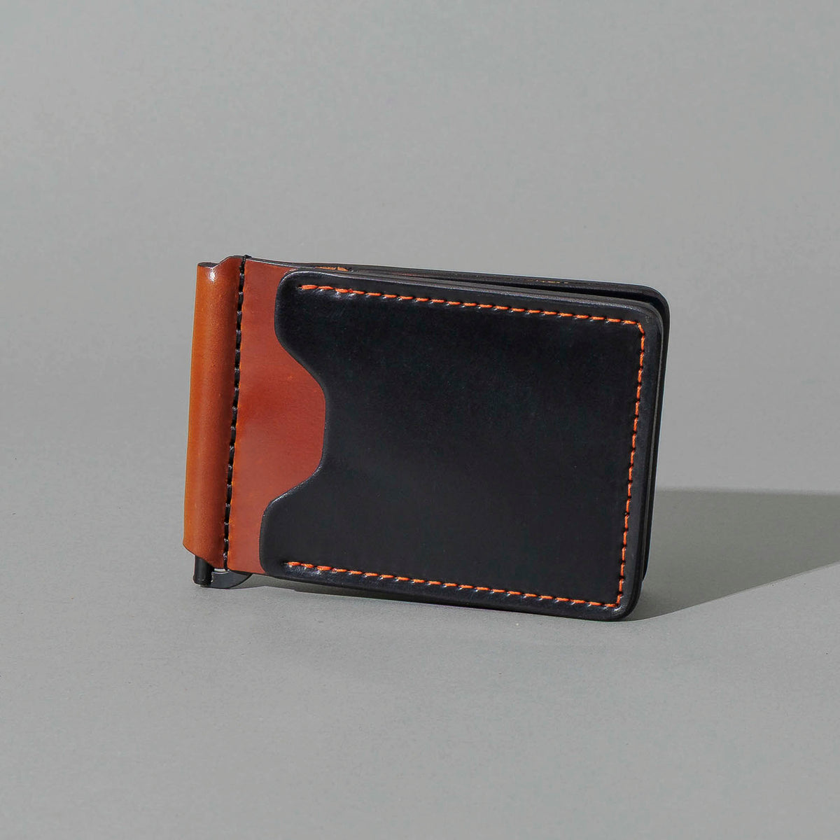 One-Off Capone Money Clip in Black on Blood Orange Shell Cordovan, front view