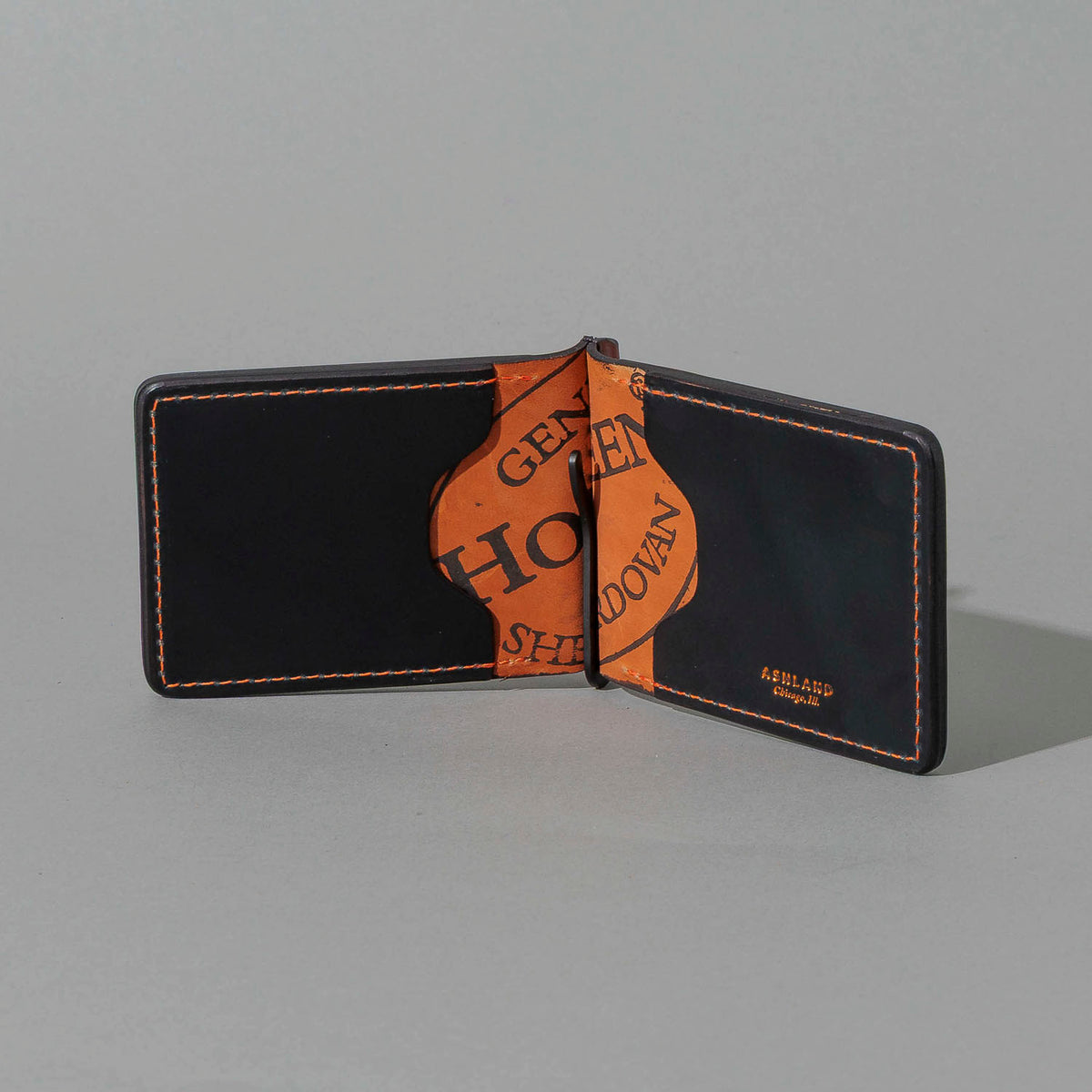 One-Off Capone Money Clip in Black on Blood Orange Shell Cordovan, open, showing interior