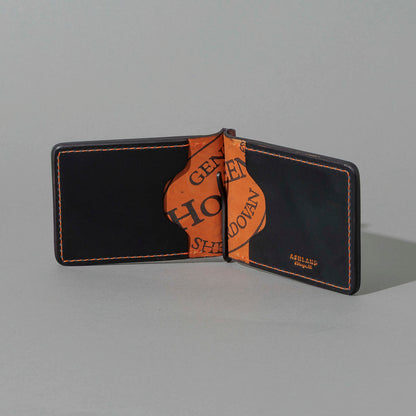 One-Off Capone Money Clip in Black on Blood Orange Shell Cordovan, open, showing interior