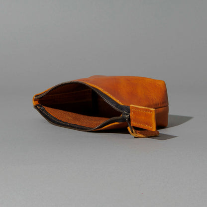 One-Off Prototype Pouch in Acorn Aspen Horsehide, angled view lying flat, shot 2