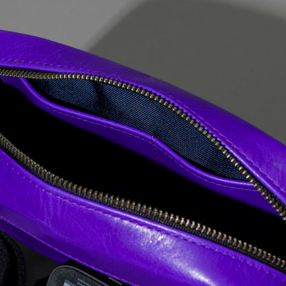 One-Off Sling Bag in Violet Latigo, unzipped, showing interior