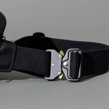 Sling Bag in Black Aspen Horsehide, close-up of the metal buckle and strap, shot 1