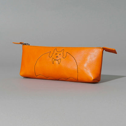 One-Off Zipper Pouch in Orange Latigo, Bat Embroidery, close-up of the embroidery, shot 1
