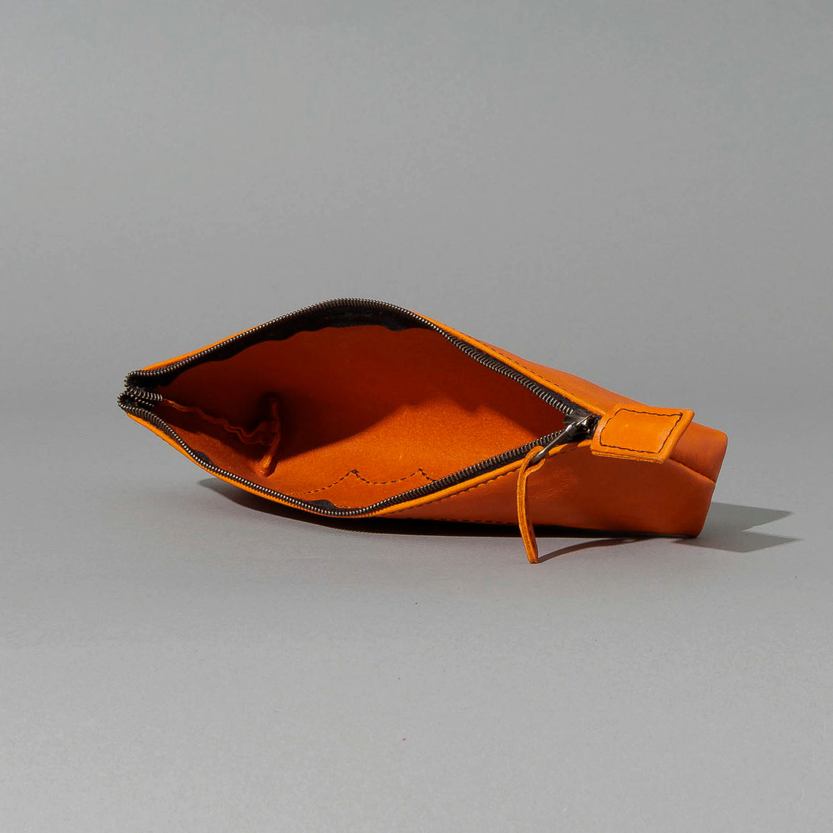 One-Off Zipper Pouch in Orange Latigo, Bat Embroidery, unzipped, showing interior