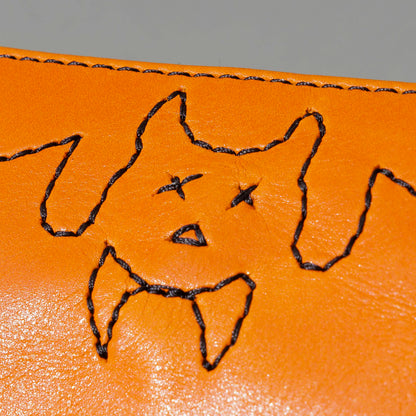 One-Off Zipper Pouch in Orange Latigo, Bat Embroidery, close-up of the embroidery, shot 2
