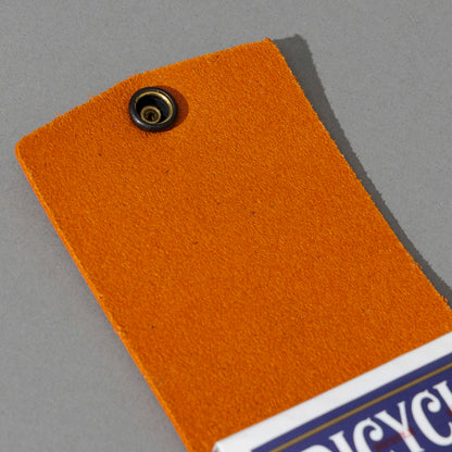 Leather Playing Card Case in Orange Latigo, open with a deck of playing cards, shot 4