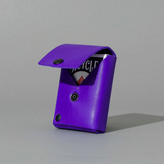 Leather Playing Card Case in Violet Latigo, open with a deck of playing cards, shot 1