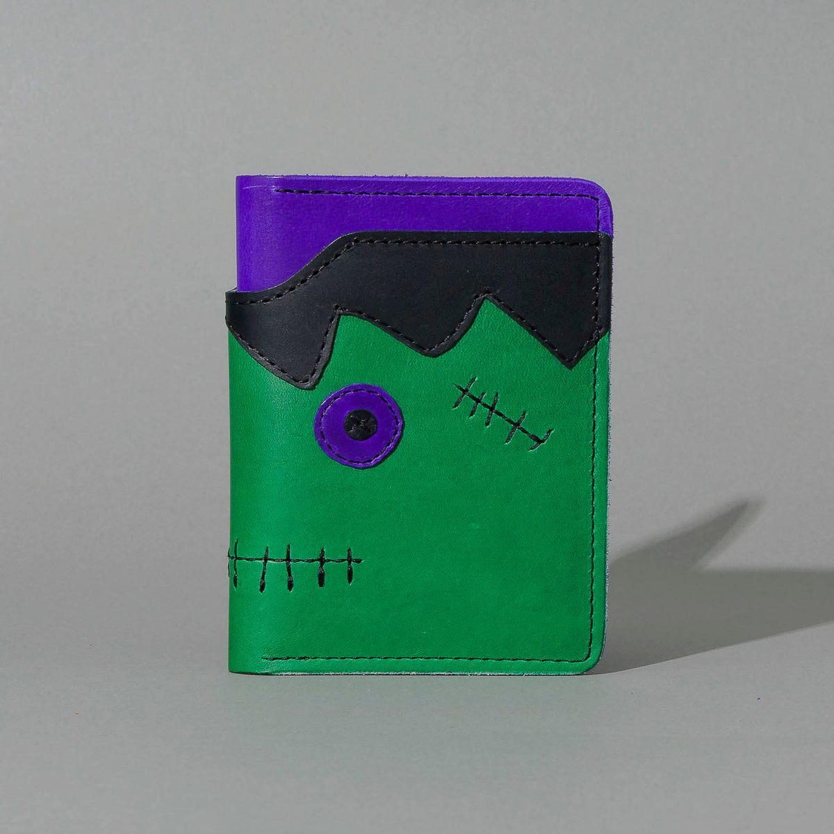 One-Off Fat Herbie in Green and Violet Latigo, Frankenstein Embroidery, standing upright, side angle, shot 2