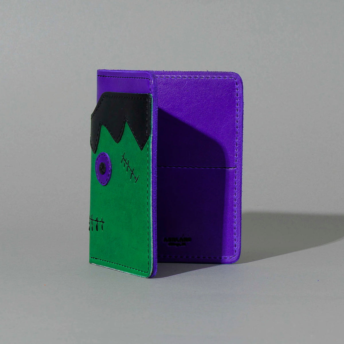 One-Off Fat Herbie in Green and Violet Latigo, Frankenstein Embroidery, standing upright, side angle, shot 1
