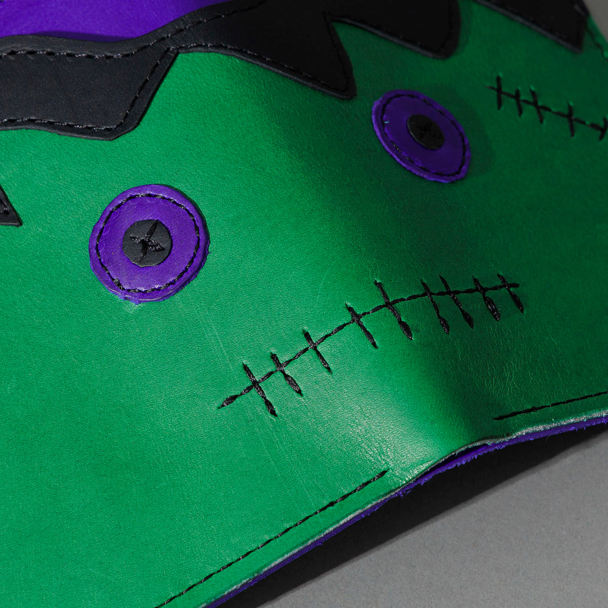 One-Off Fat Herbie in Green and Violet Latigo, Frankenstein Embroidery, close-up of the embroidery, shot 3