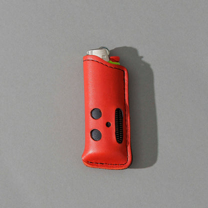 One-Off Skeleton Lighter in Red Latigo, standing upright, side angle