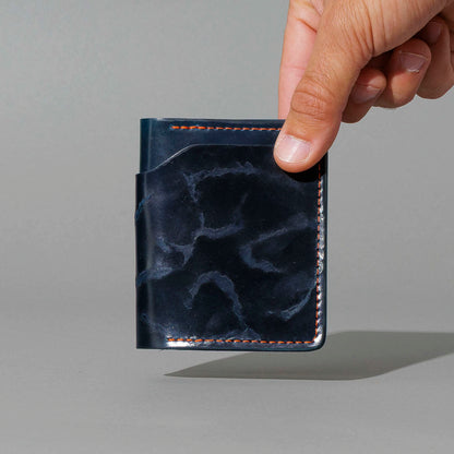 One-Off Tony the Ant in Branded Blue Shell Cordovan, held in hand, shot 1