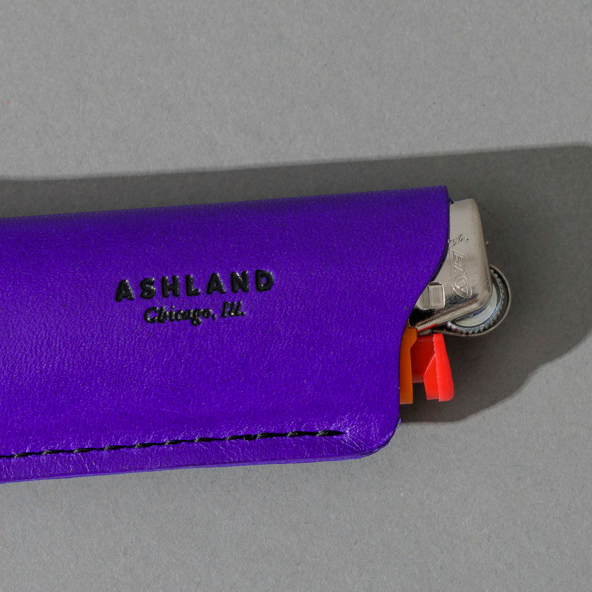Lighter in Violet Latigo, close-up detail